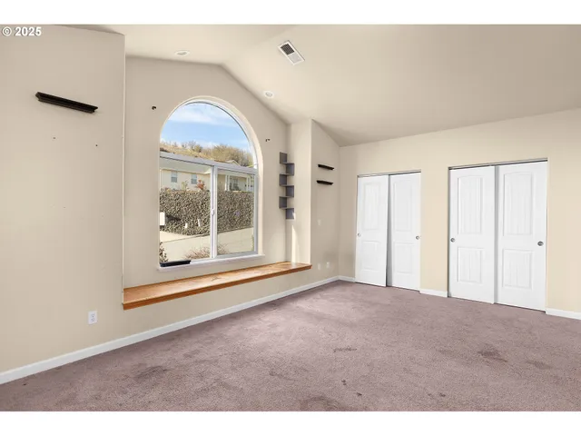 a view of empty room with front door