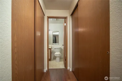 a view of a bathroom from a hallway