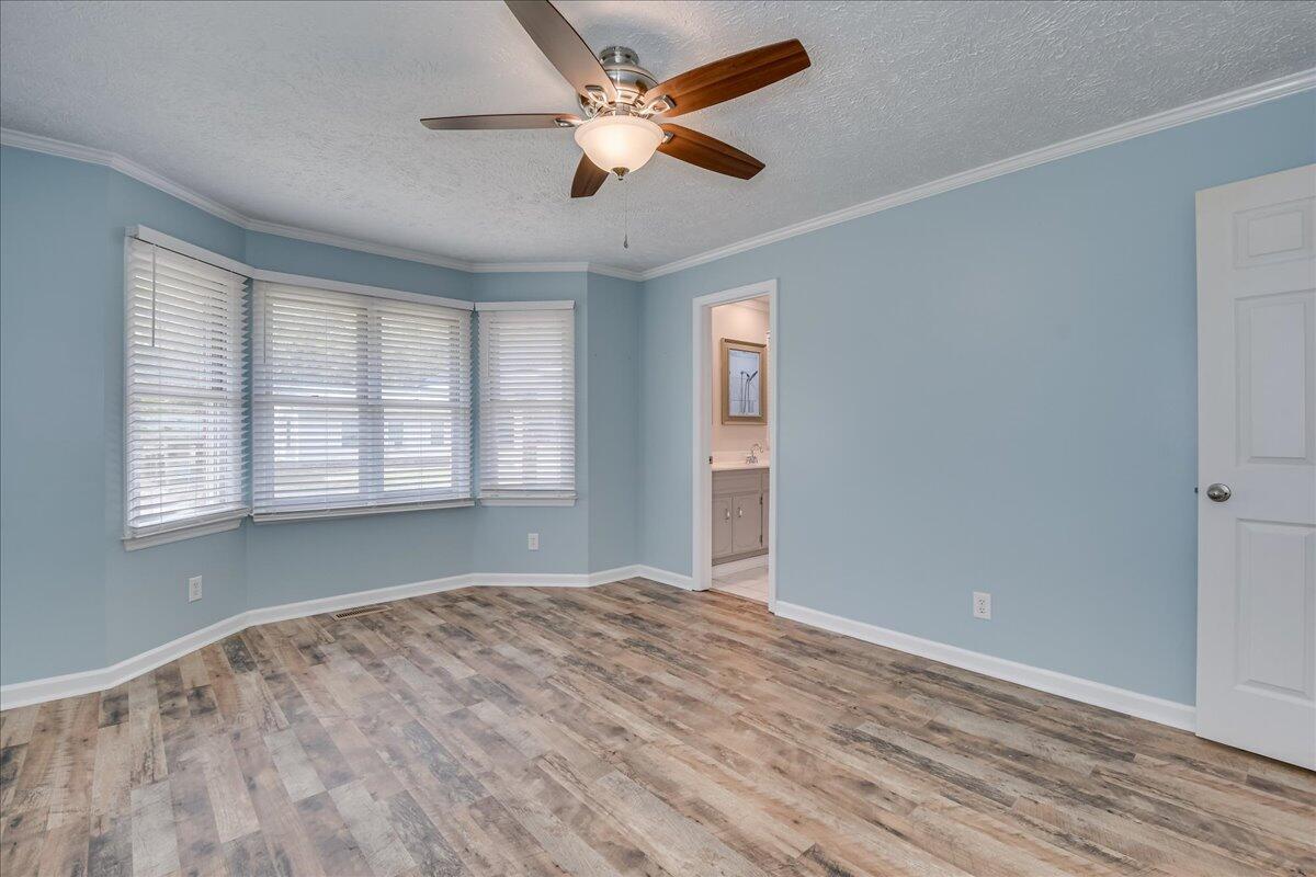 165 Morris Road Thomson, GA 30824 - Photo 13 of 26 Primary bedroom with two walk-in closets