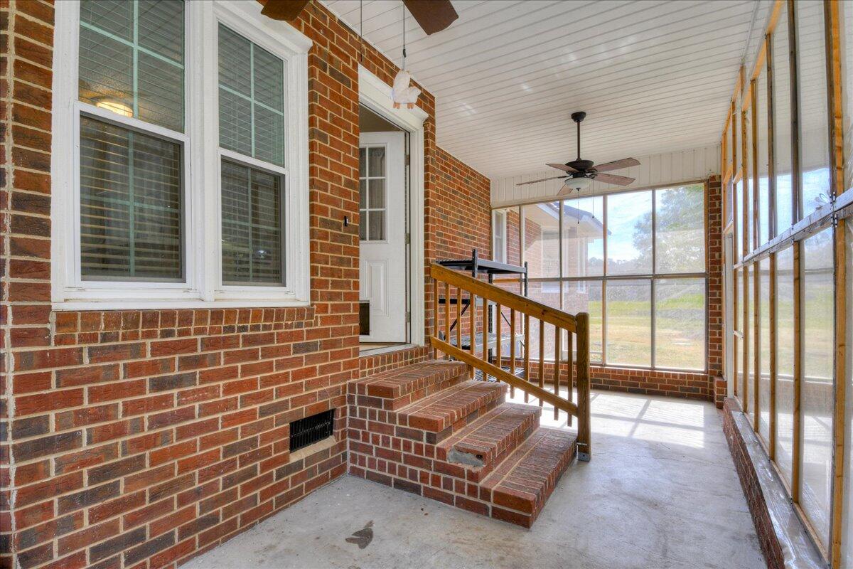 165 Morris Road Thomson, GA 30824 - Photo 21 of 26 Rear screened porch