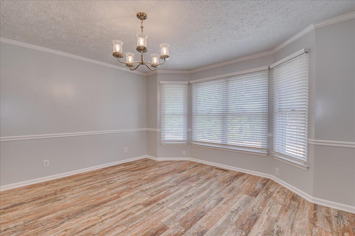 165 Morris Road Thomson, GA 30824 - Photo 8 of 26 Dining room with bay window and updated lighting.
