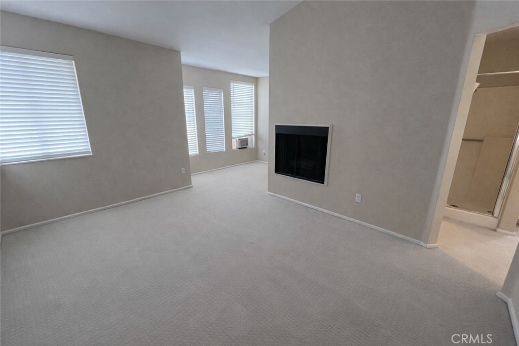 9275 Rancho Park Place Rancho Cucamonga, CA 91730 - Photo 14 of 33 Primary Bedroom. Image has been altered and does not portray the property as it exists today. Certain elements may have been deleted, color, brightness and contrast have been edited.