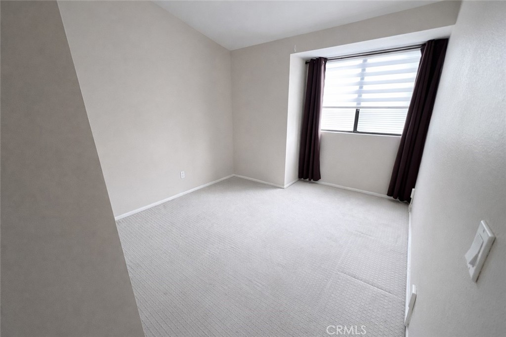 9275 Rancho Park Place Rancho Cucamonga, CA 91730 - Photo 23 of 33 Second Bedroom. Image has been altered and does not portray the property as it exists today. Certain elements may have been deleted, color, brightness and contrast have been edited.