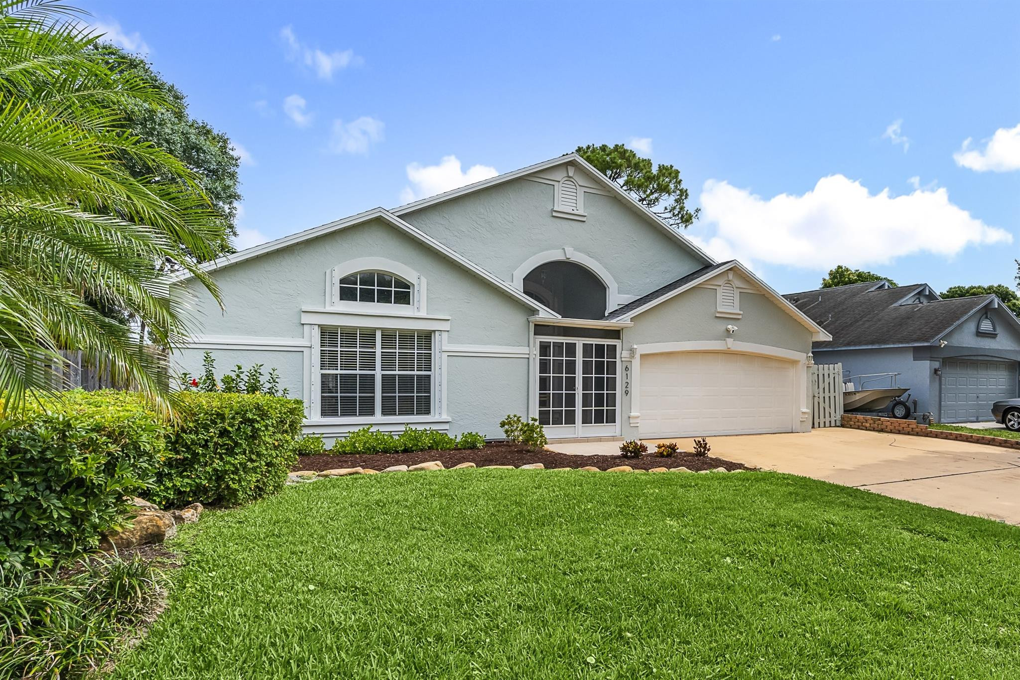 6129 Hollywood Street Jupiter, FL 33458 - Photo 1 of 35 Photo 1