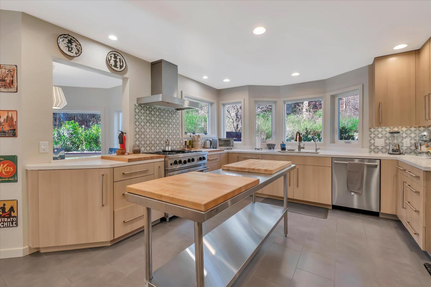 1573 North Rodeo Gulch Road Soquel, CA 95073 - Photo 11 of 40 a kitchen with sink cabinets and window