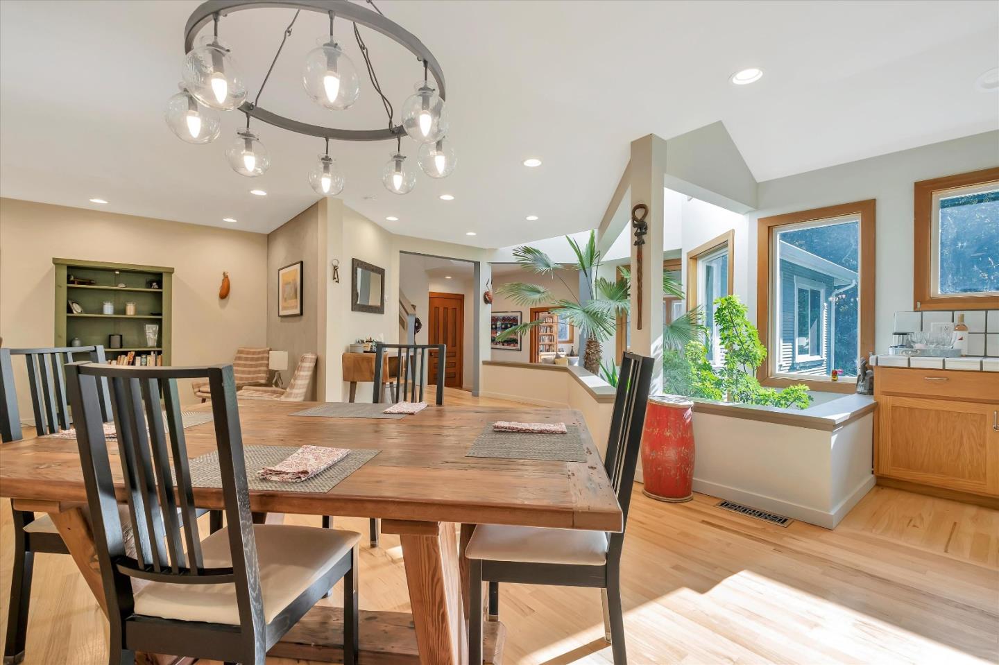 1573 North Rodeo Gulch Road Soquel, CA 95073 - Photo 15 of 40 a view of a dining room with furniture window and wooden floor