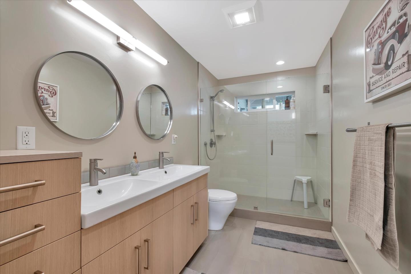 1573 North Rodeo Gulch Road Soquel, CA 95073 - Photo 21 of 40 a spacious bathroom with a double vanity sink mirror and toilet