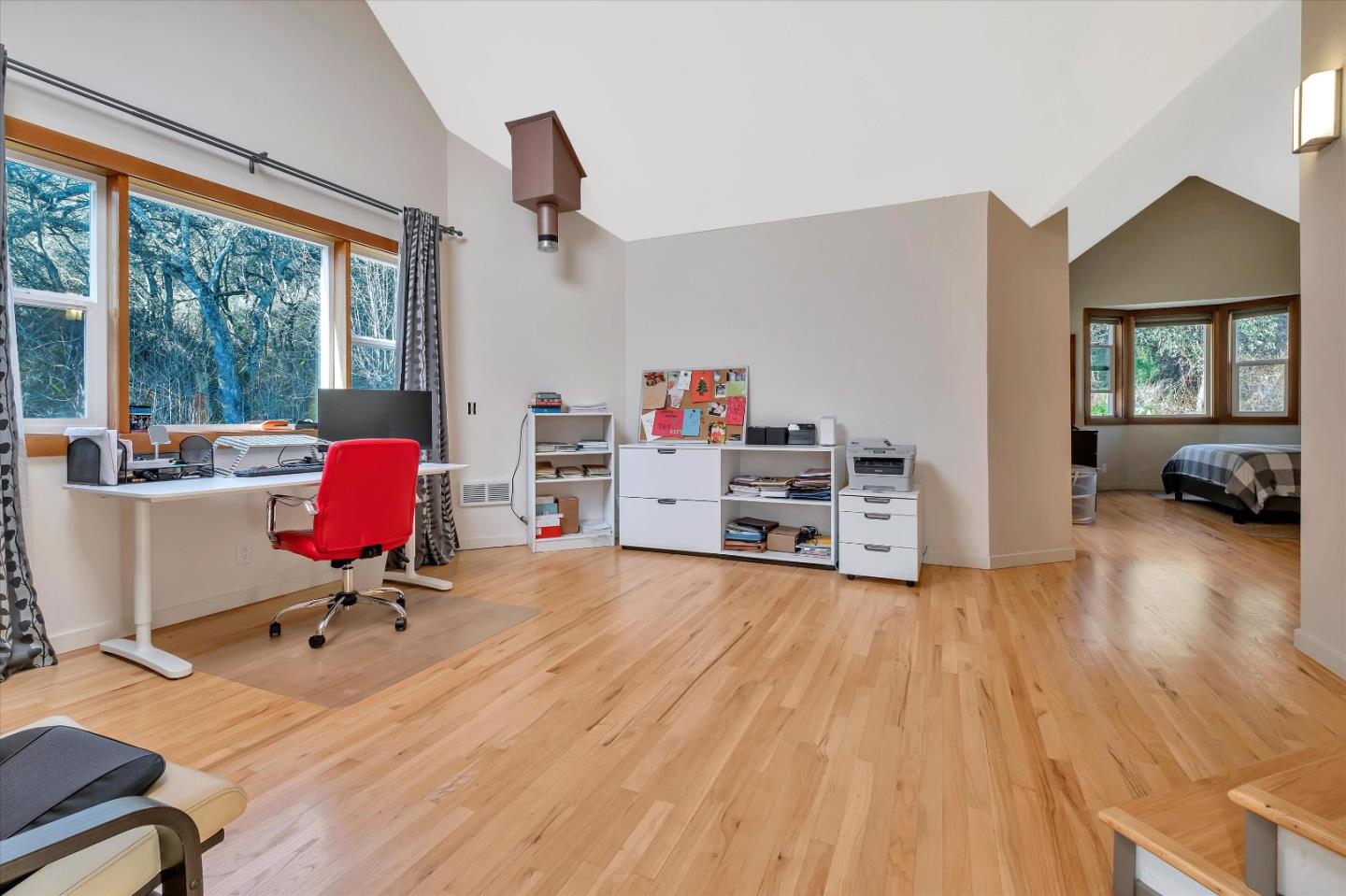 1573 North Rodeo Gulch Road Soquel, CA 95073 - Photo 24 of 40 a living room with furniture and a wooden floor
