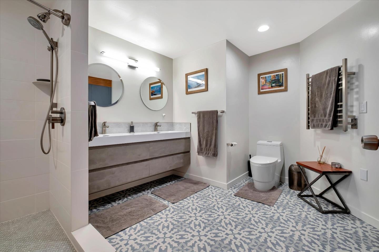 1573 North Rodeo Gulch Road Soquel, CA 95073 - Photo 29 of 40 a bathroom with a sink and a mirror