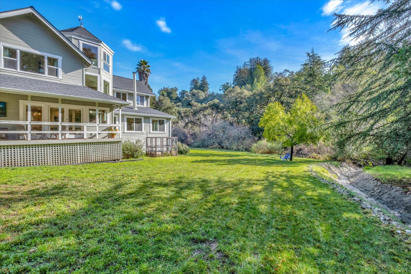 1573 North Rodeo Gulch Road Soquel, CA 95073 - Photo 36 of 40 a house view with a garden space