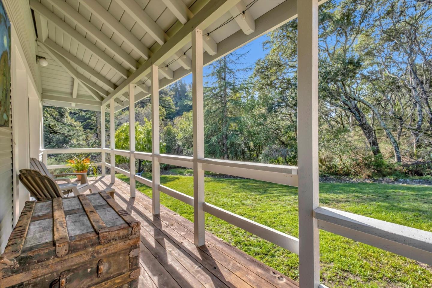 1573 North Rodeo Gulch Road Soquel, CA 95073 - Photo 37 of 40 a view of a porch with chairs and wooden floor