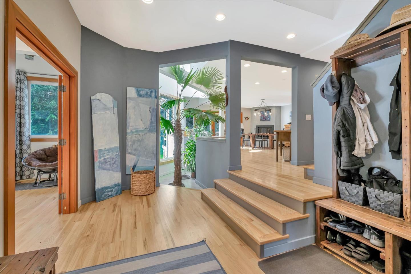 1573 North Rodeo Gulch Road Soquel, CA 95073 - Photo 4 of 40 a bedroom with furniture and a flat screen tv