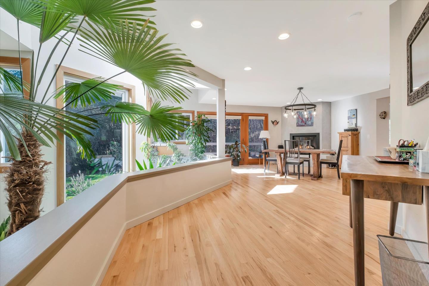 1573 North Rodeo Gulch Road Soquel, CA 95073 - Photo 6 of 40 a view of a kitchen with dining table and chairs