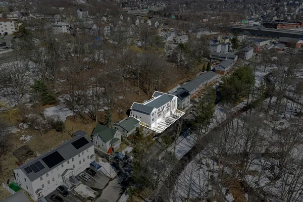an aerial view of residential house with outdoor space