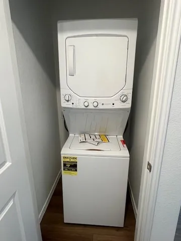 an empty room with closet area