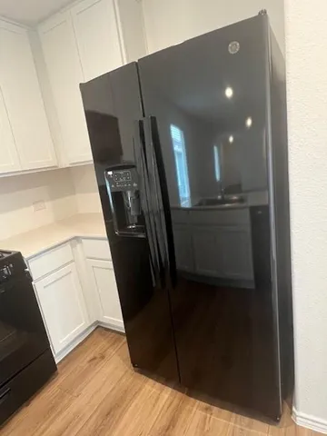 a view of closet area with empty racks