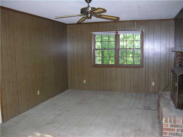 1630 Mason Road Durham, NC 27712 - Photo 2 of 9 Den With Fire Place