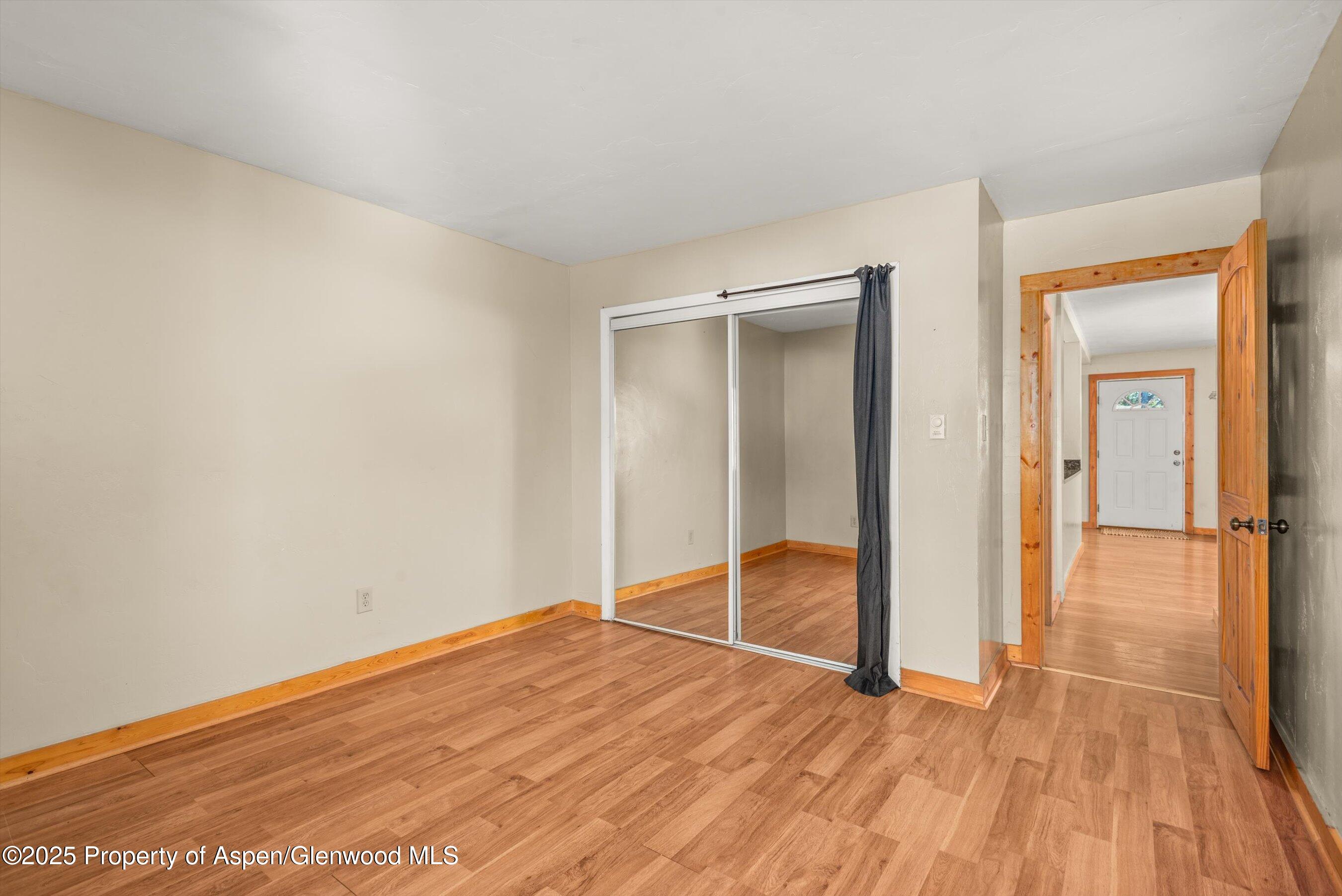 718 Main Street Carbondale, CO 81623 - Photo 16 of 27 wooden floor in an empty room