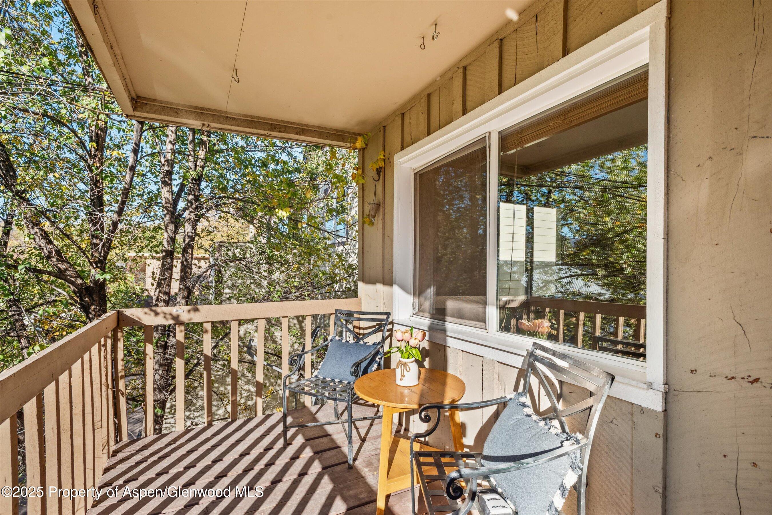 718 Main Street Carbondale, CO 81623 - Photo 18 of 27 a view of a chairs and table in the balcony