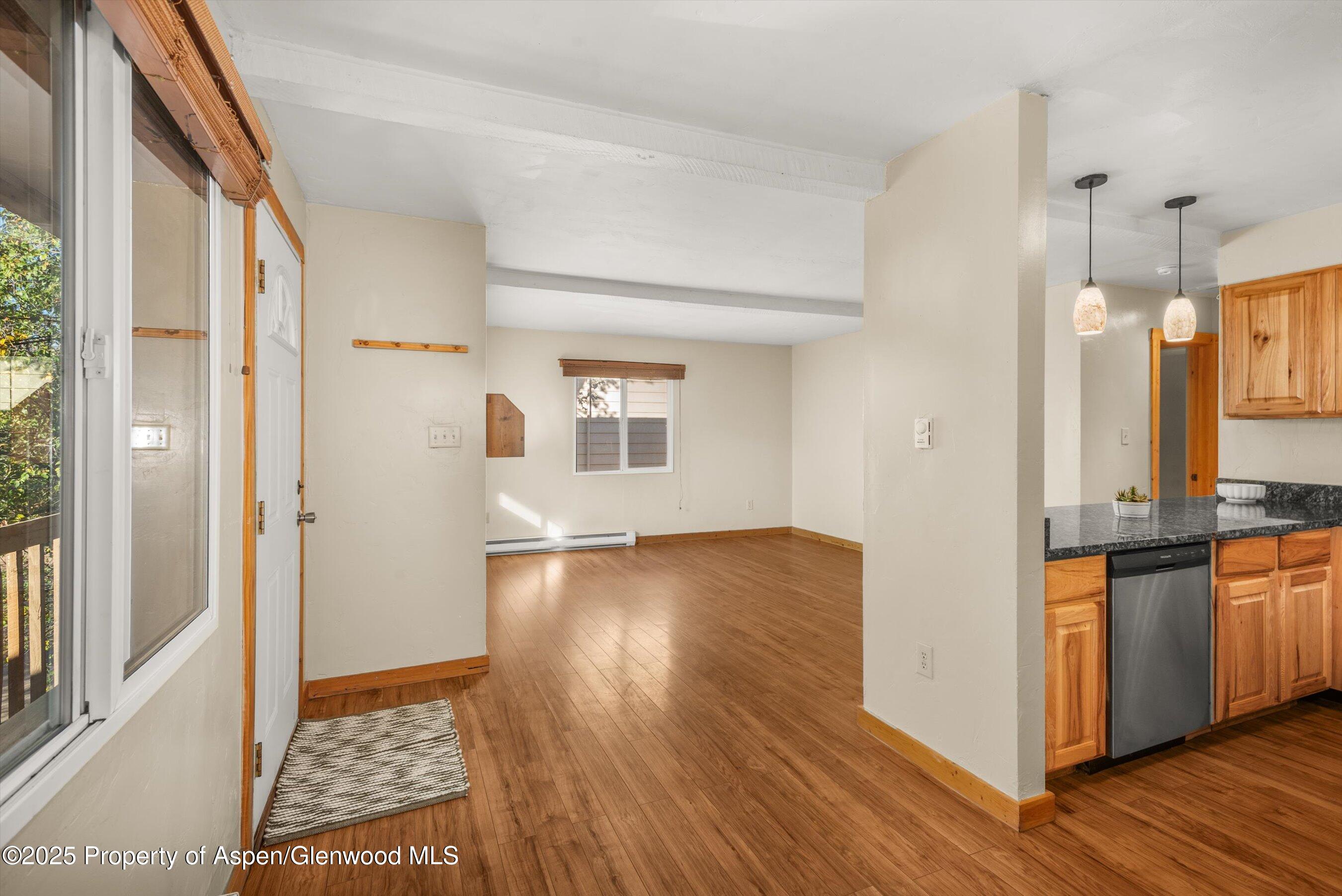 718 Main Street Carbondale, CO 81623 - Photo 2 of 27 a view of a kitchen cabinets and wooden floor