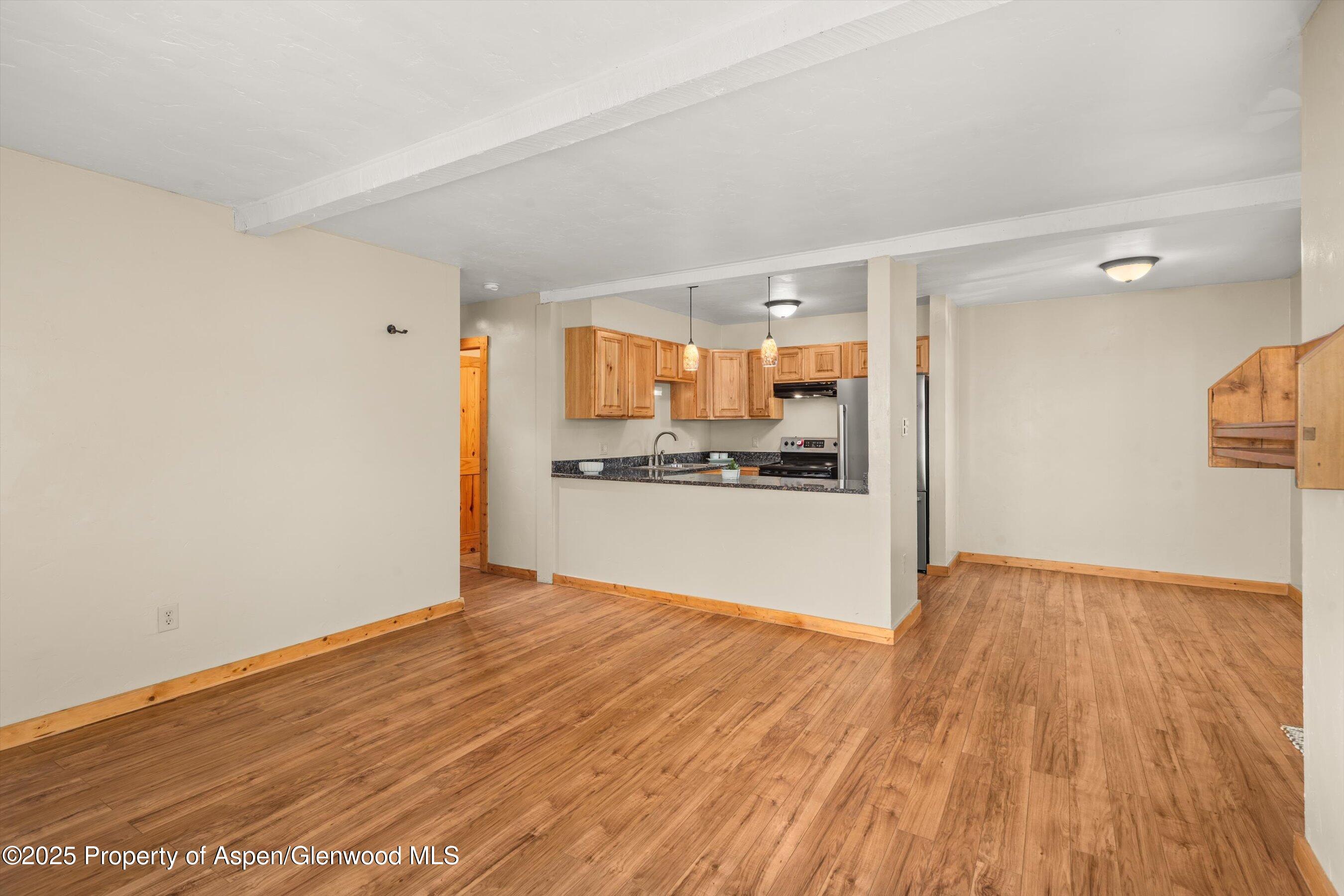 718 Main Street Carbondale, CO 81623 - Photo 3 of 27 a view of kitchen with wooden floor