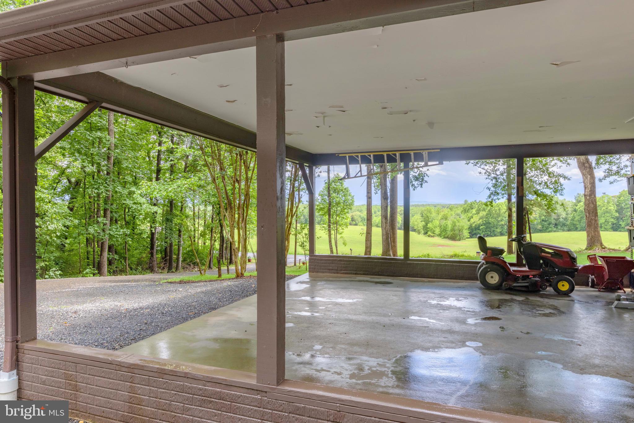 1425 Jacks Shop Road Rochelle, VA 22738 - Photo 44 of 56 a view of a room with porch and wooden floor