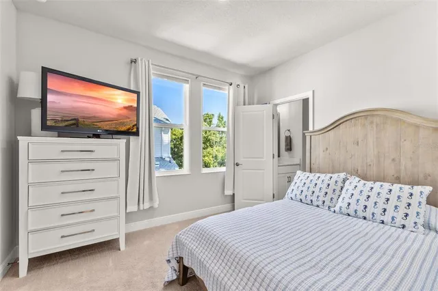 a view of a patio with couches and a fire pit