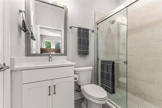 a view of a yard with palm trees