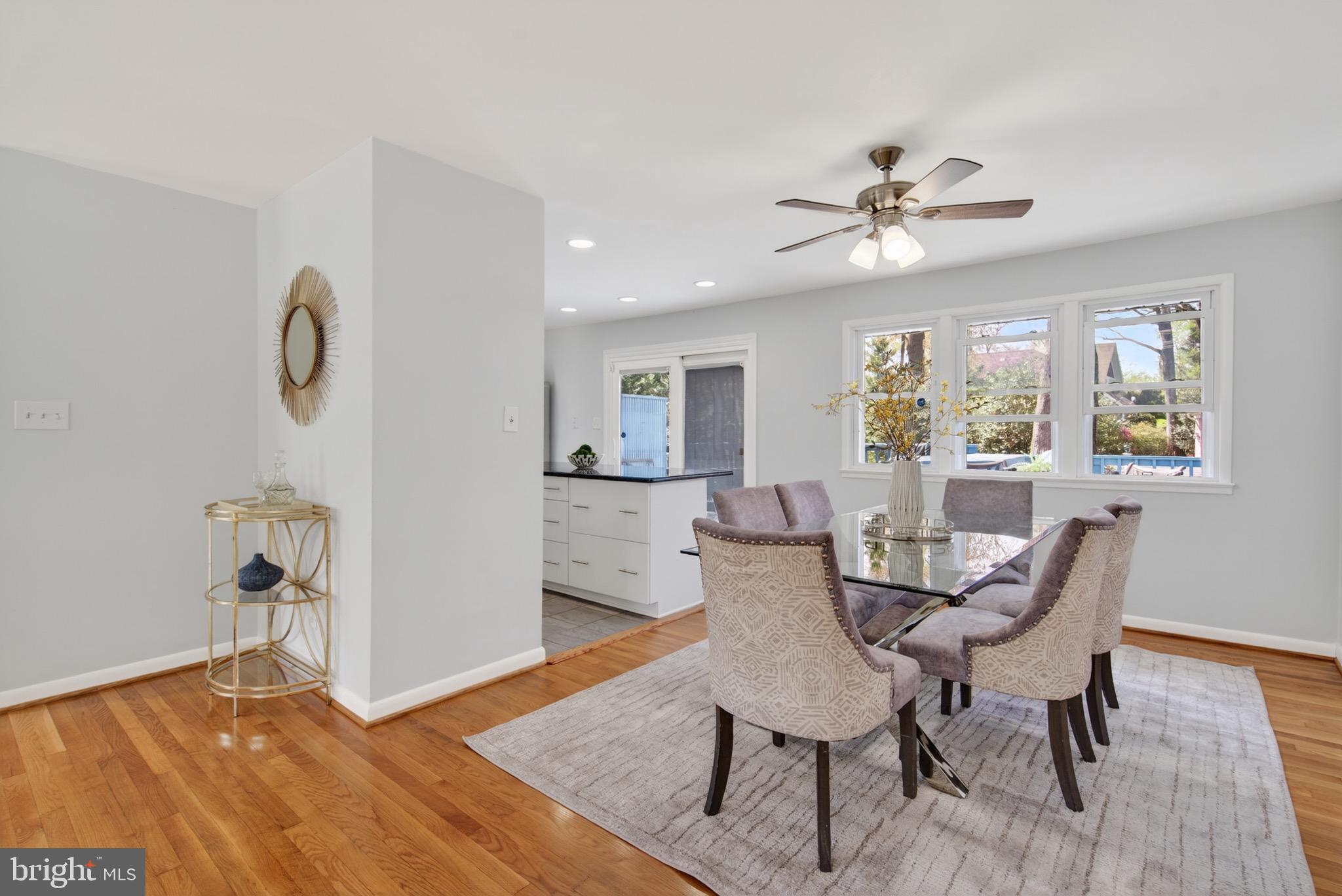 6535 Old Chesterbrook Road McLean, VA 22101 - Photo 15 of 50 a view of a dining room with furniture and wooden floor