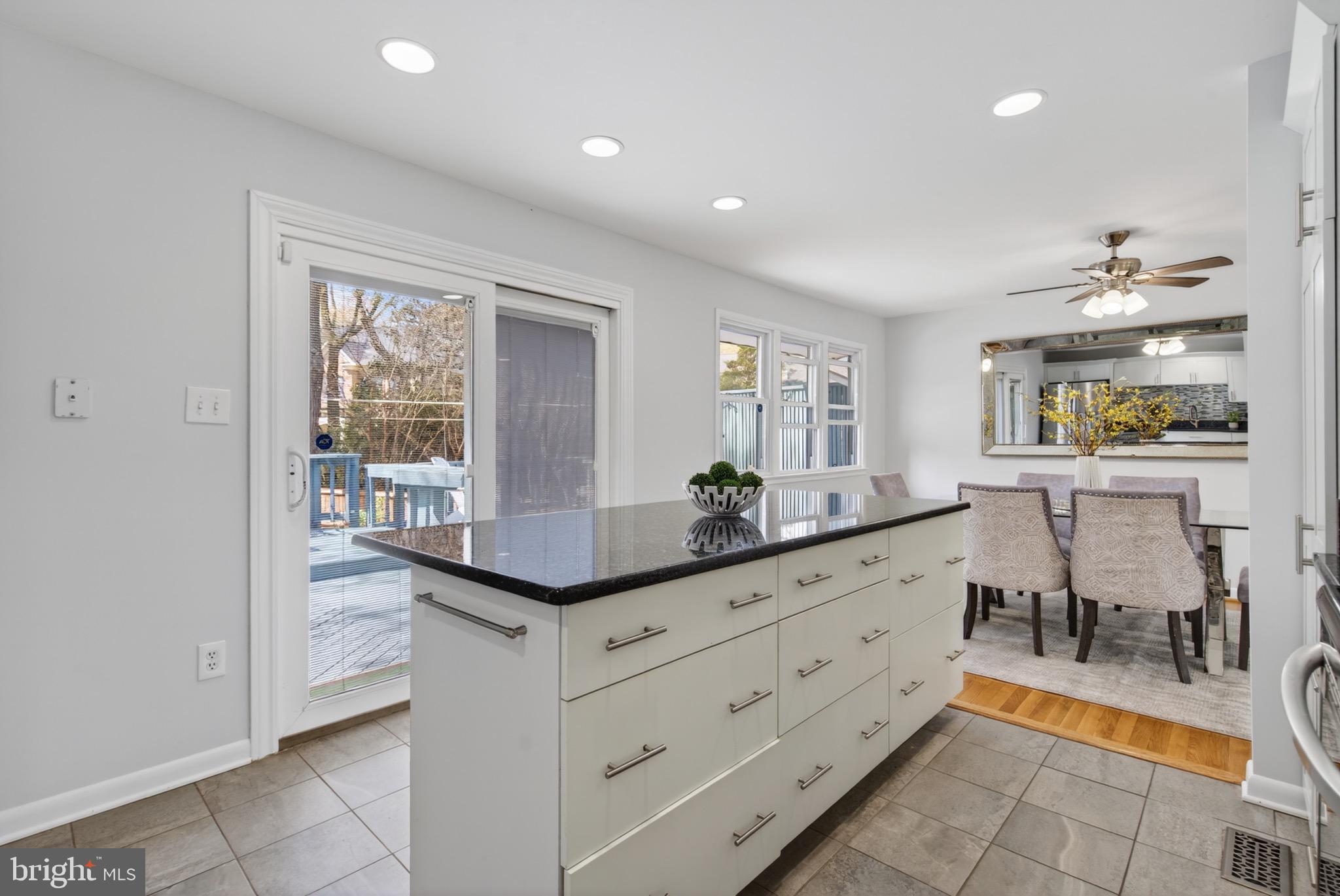 6535 Old Chesterbrook Road McLean, VA 22101 - Photo 21 of 50 a dining hall with stainless steel appliances granite countertop a sink and a granite counter tops