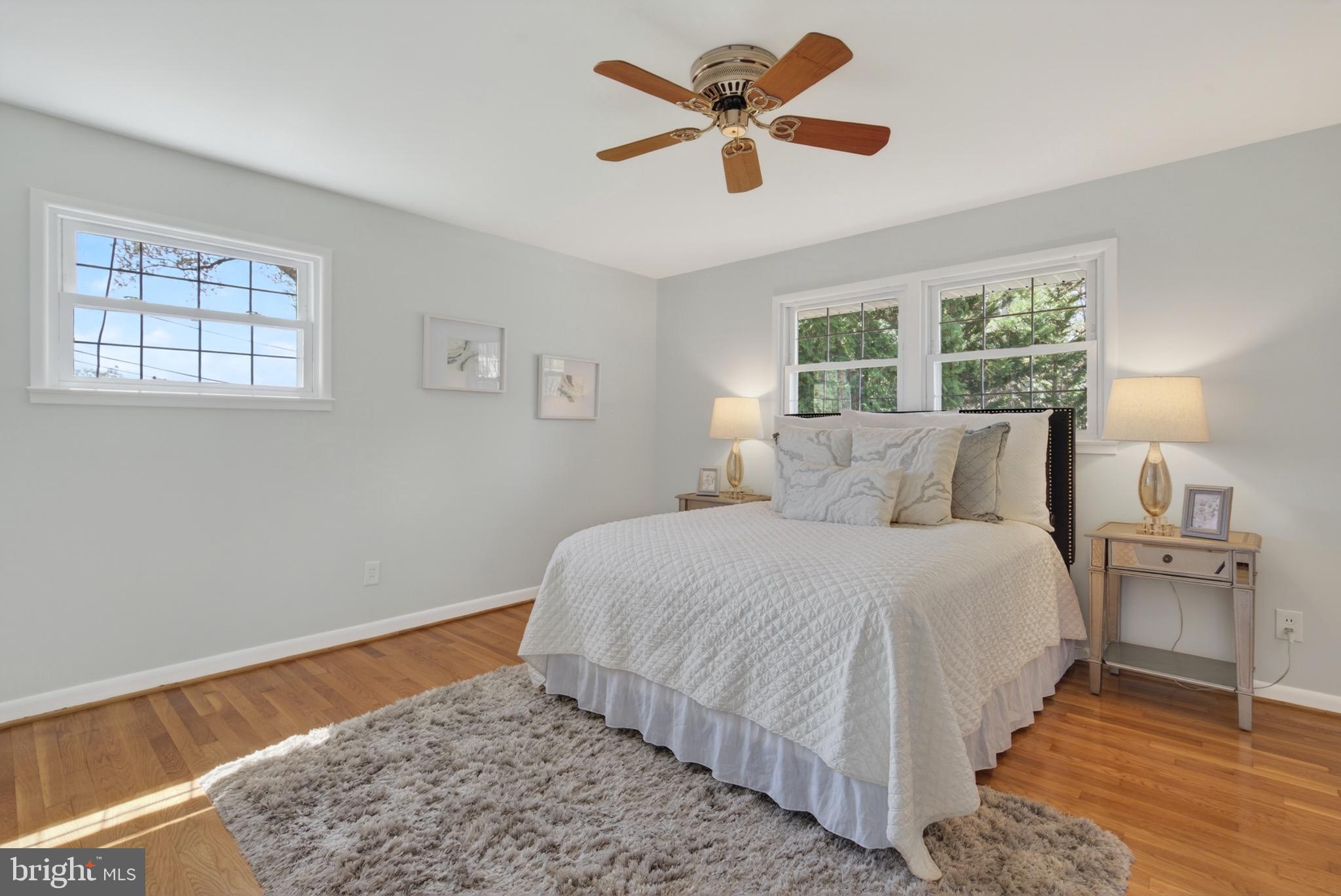 6535 Old Chesterbrook Road McLean, VA 22101 - Photo 22 of 50 a bedroom with a large bed and a window