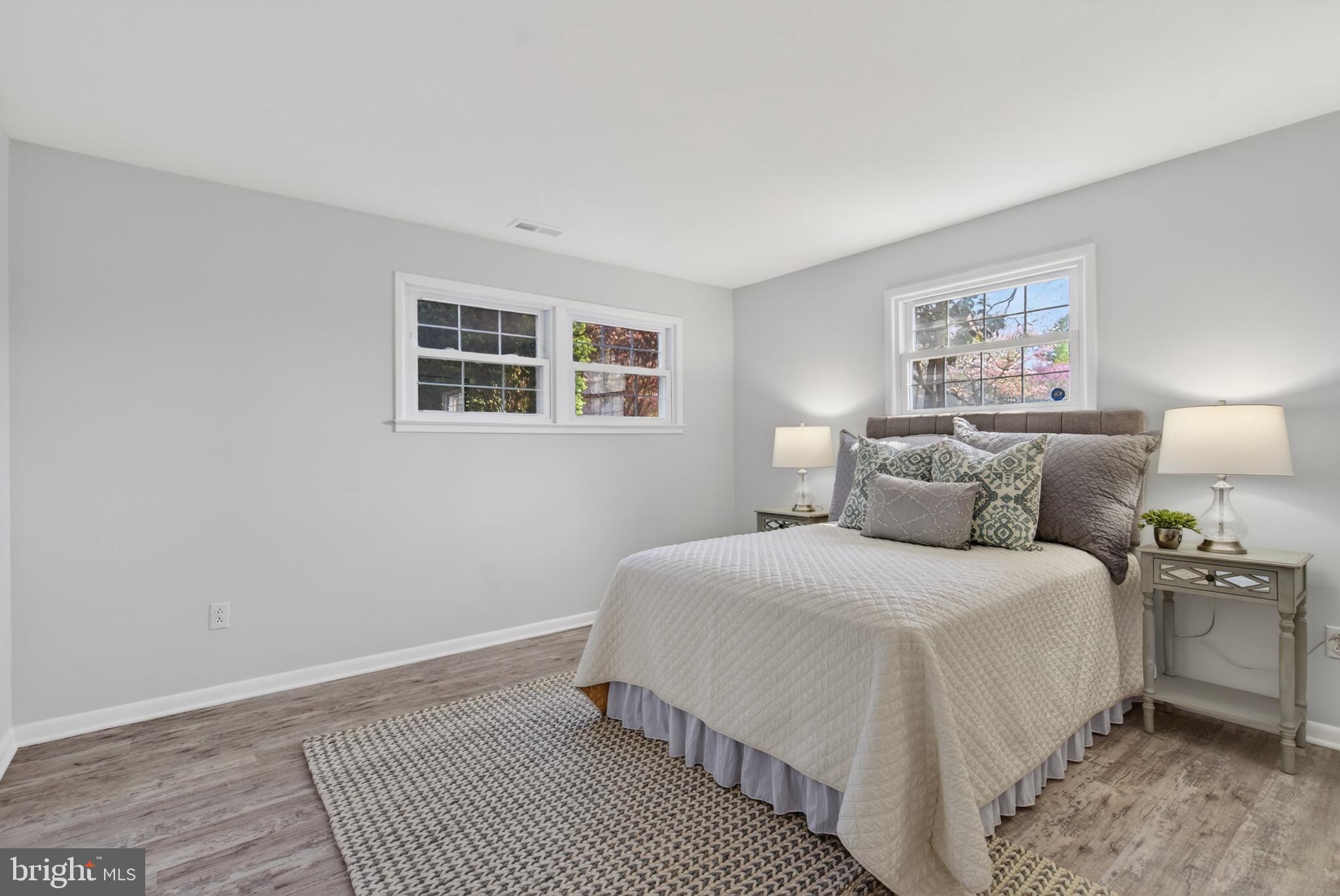 6535 Old Chesterbrook Road McLean, VA 22101 - Photo 23 of 50 a bedroom with a large bed and a window