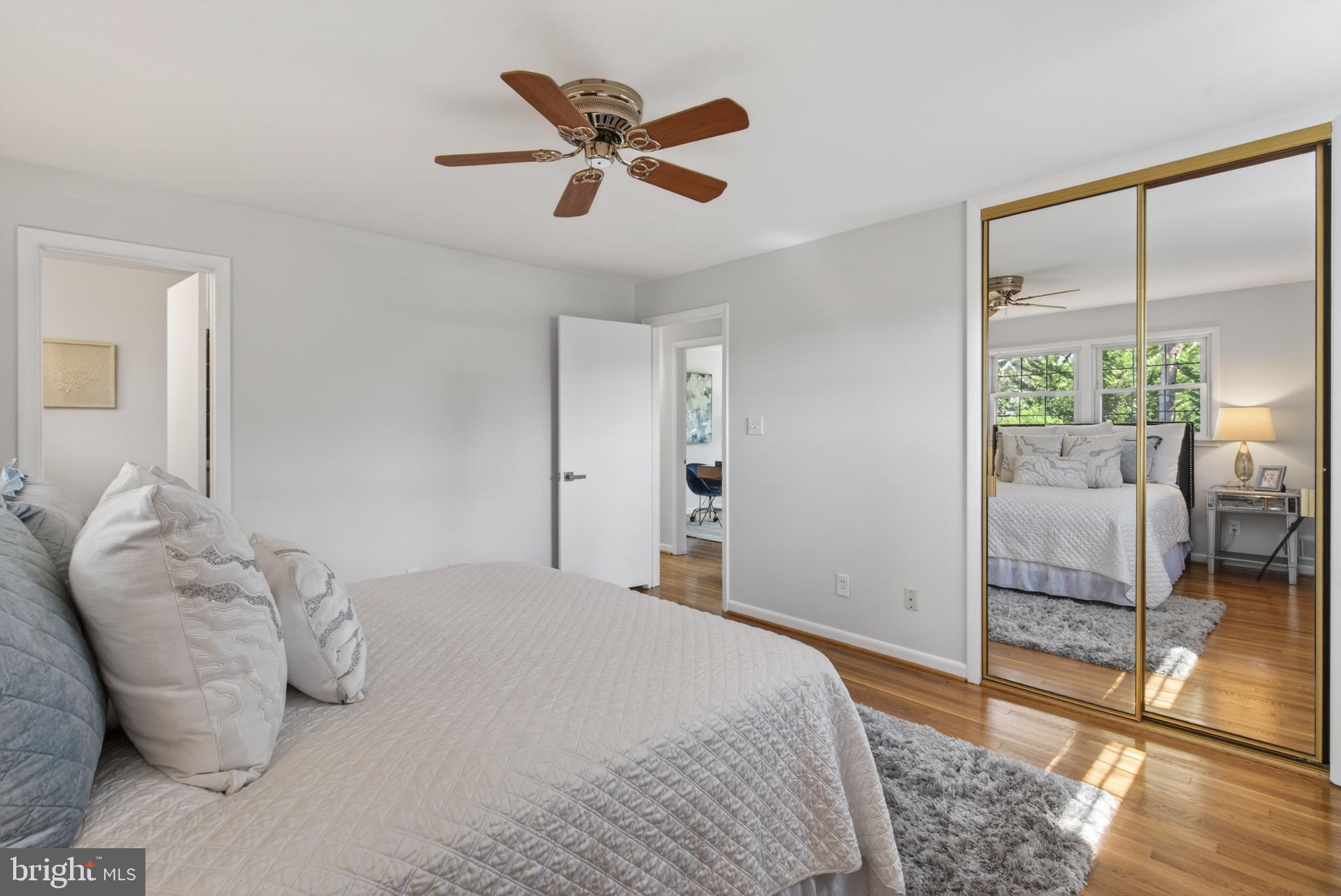6535 Old Chesterbrook Road McLean, VA 22101 - Photo 24 of 50 a bedroom with a bed and glass door