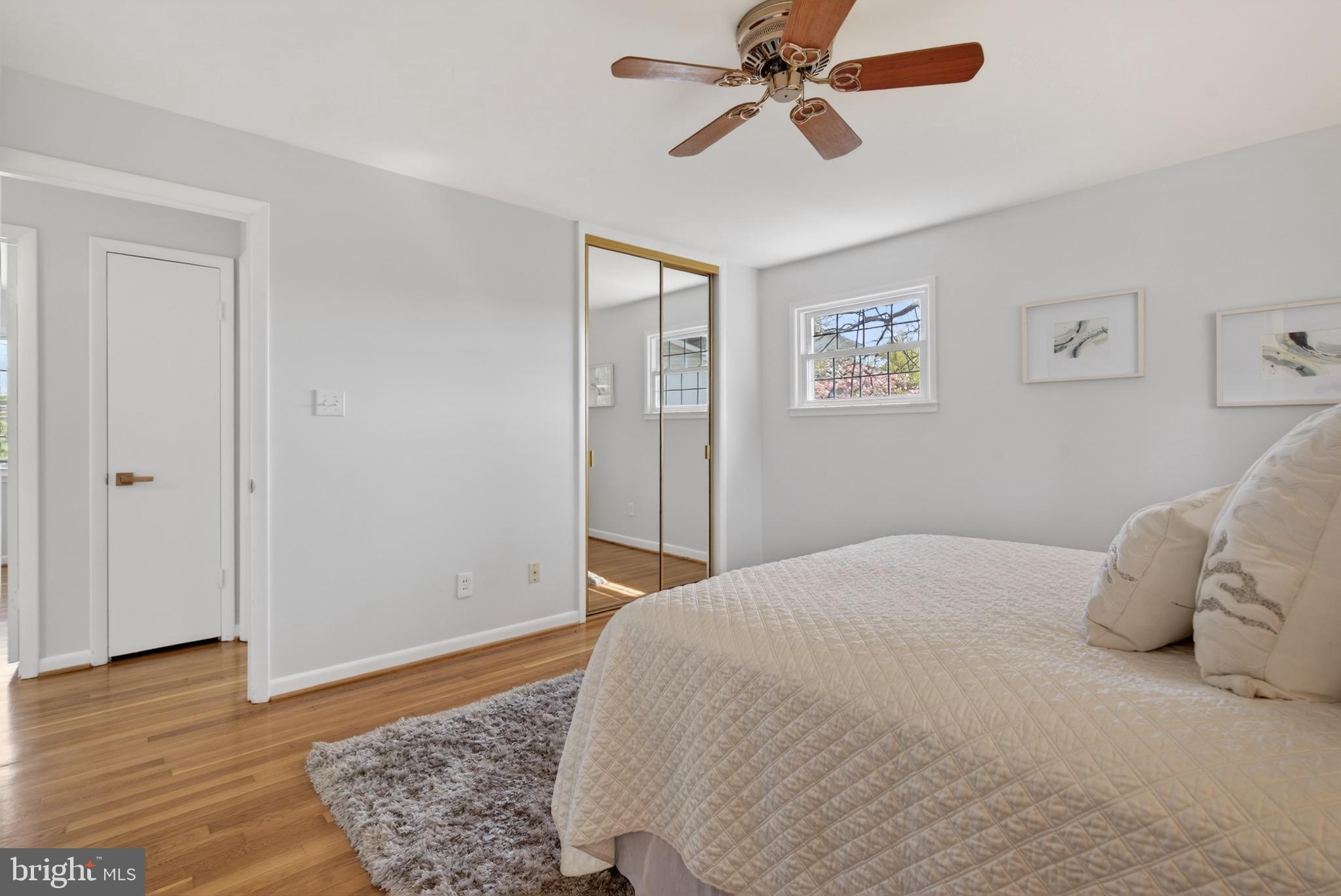 6535 Old Chesterbrook Road McLean, VA 22101 - Photo 25 of 50 a bedroom with a bed and wooden floor