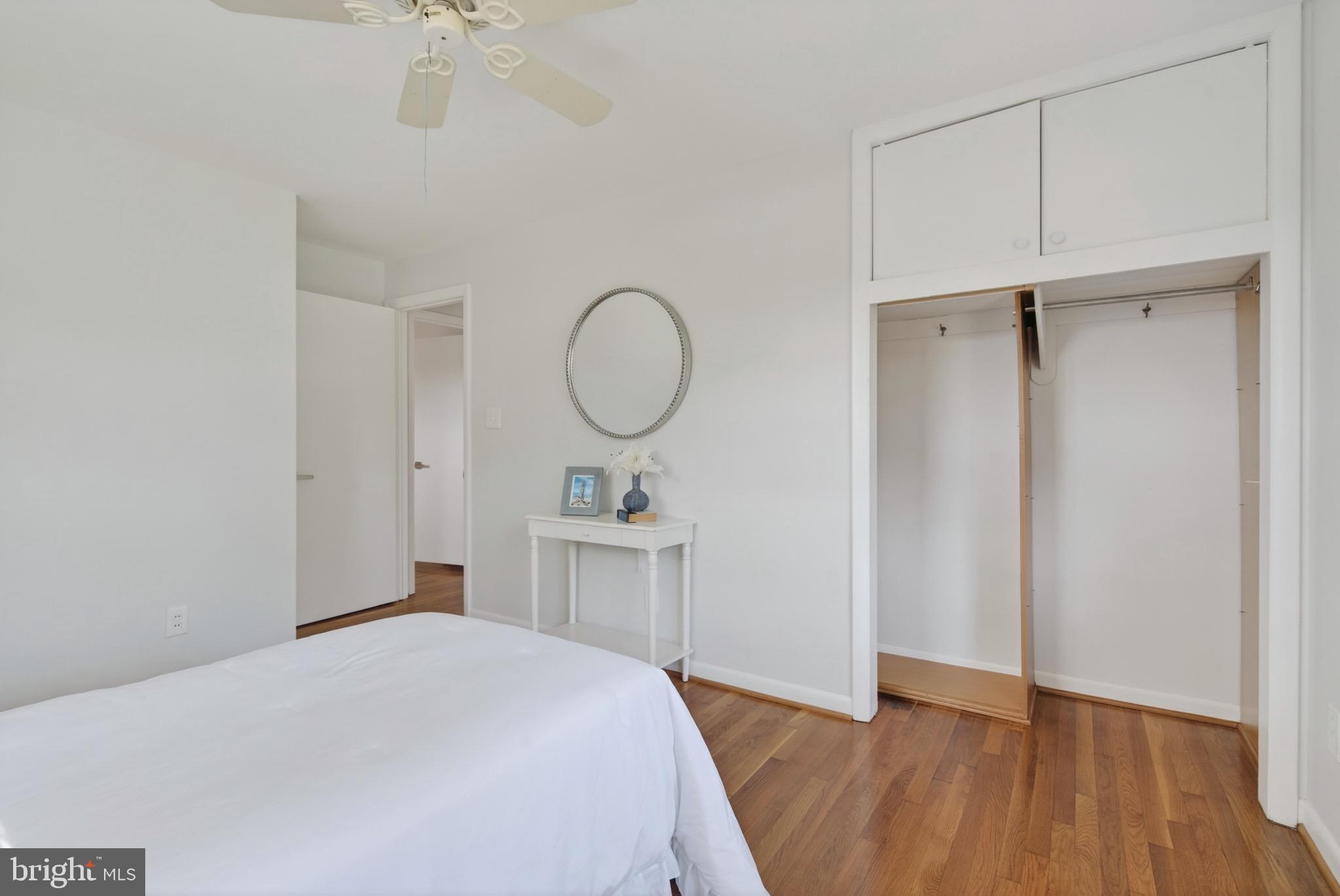 6535 Old Chesterbrook Road McLean, VA 22101 - Photo 28 of 50 a bedroom with a bed and a chandelier