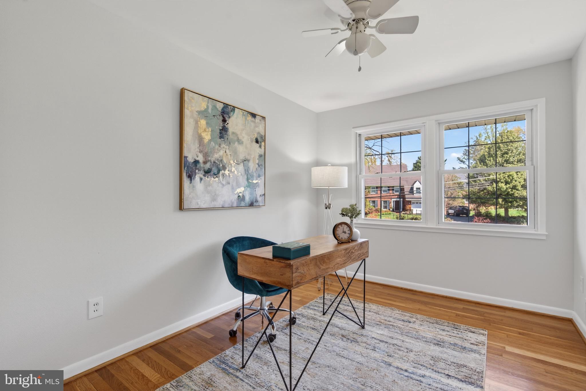 6535 Old Chesterbrook Road McLean, VA 22101 - Photo 29 of 50 a workspace with wooden floor and a window