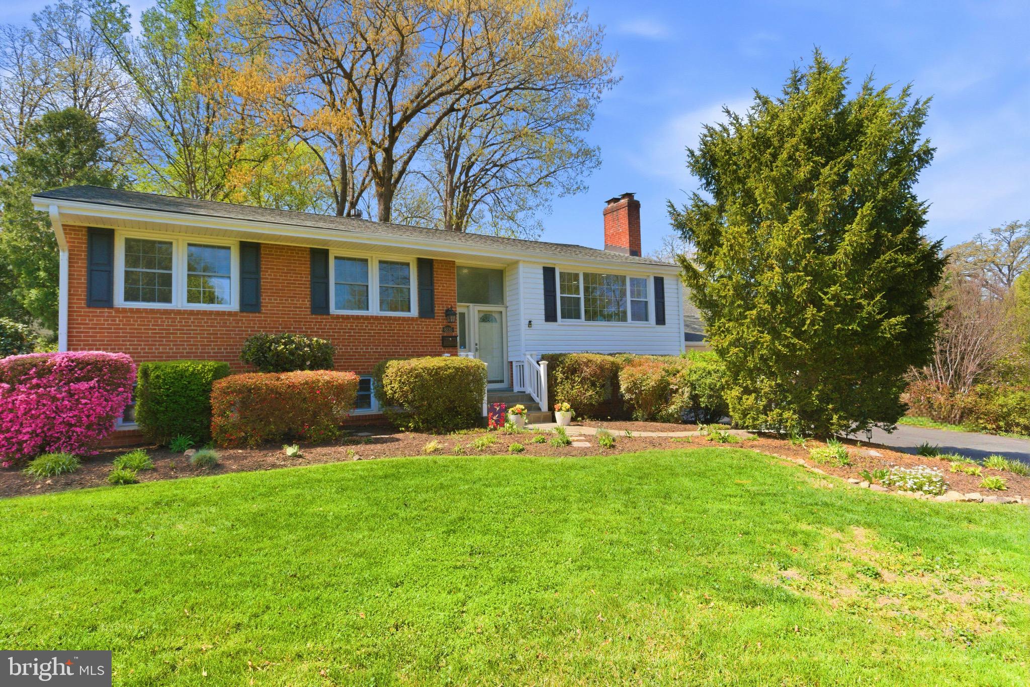 6535 Old Chesterbrook Road McLean, VA 22101 - Photo 3 of 50 a front view of house with yard and green space