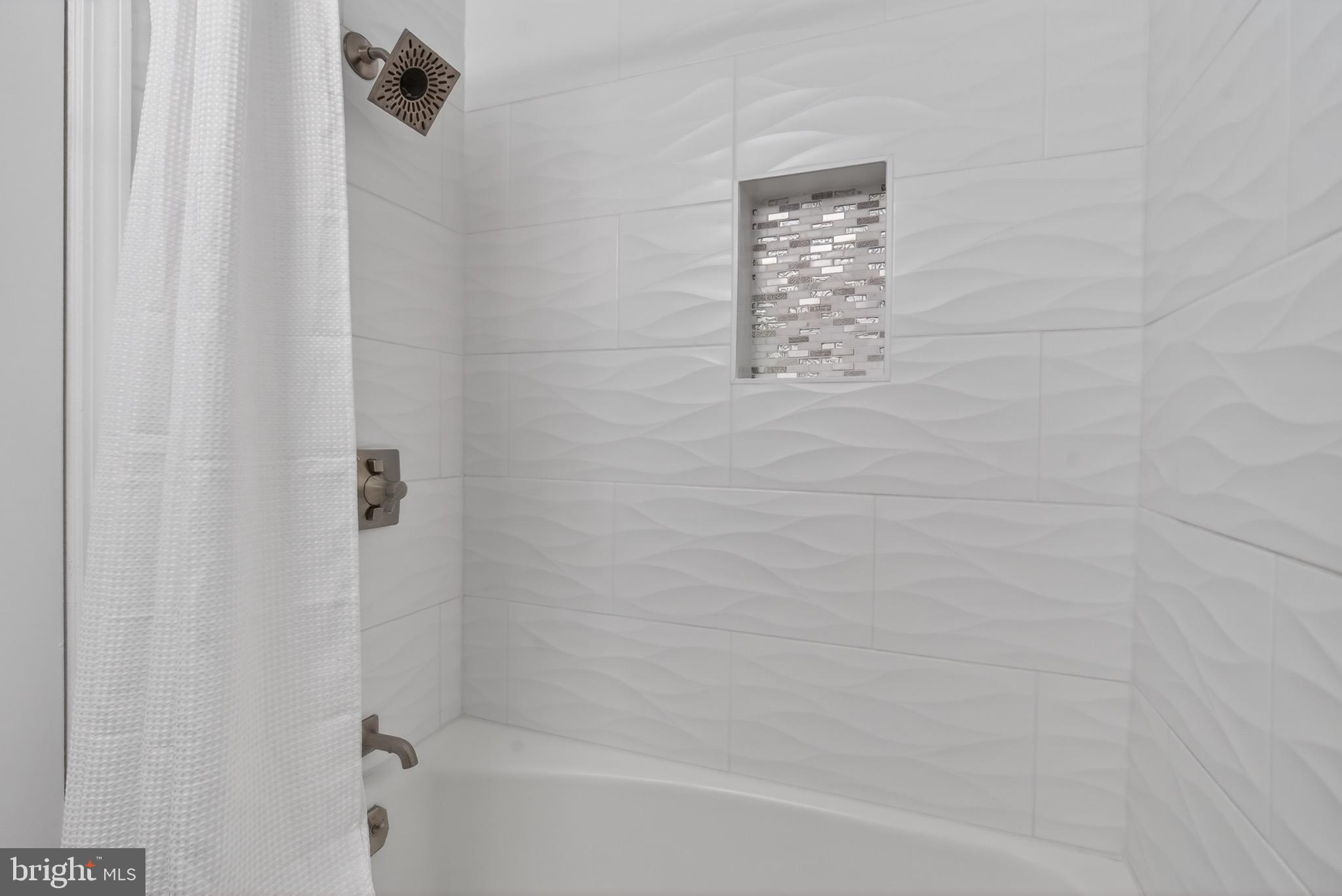 6535 Old Chesterbrook Road McLean, VA 22101 - Photo 34 of 50 a bathroom with a shower