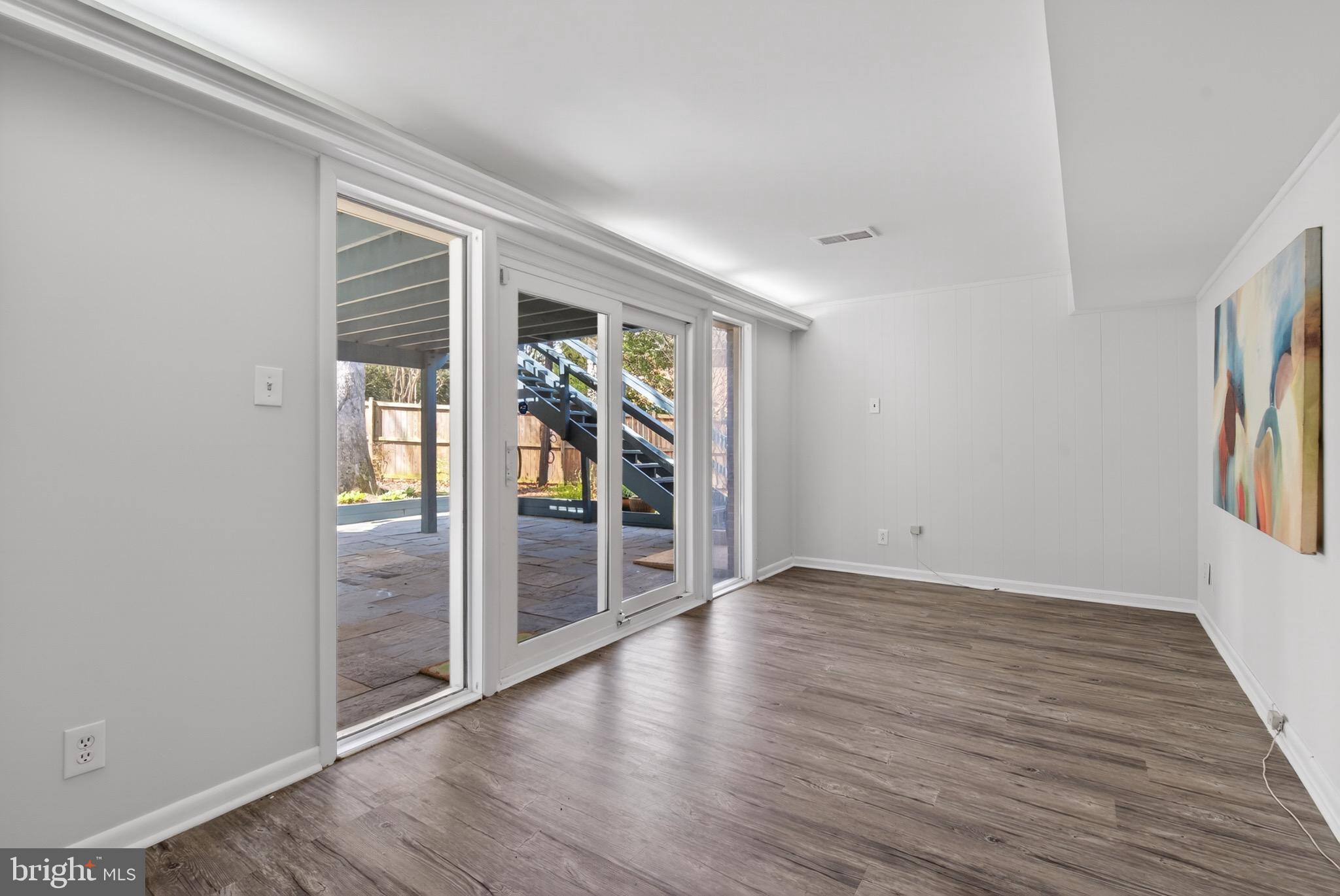 6535 Old Chesterbrook Road McLean, VA 22101 - Photo 41 of 50 wooden floor in an empty room with a window