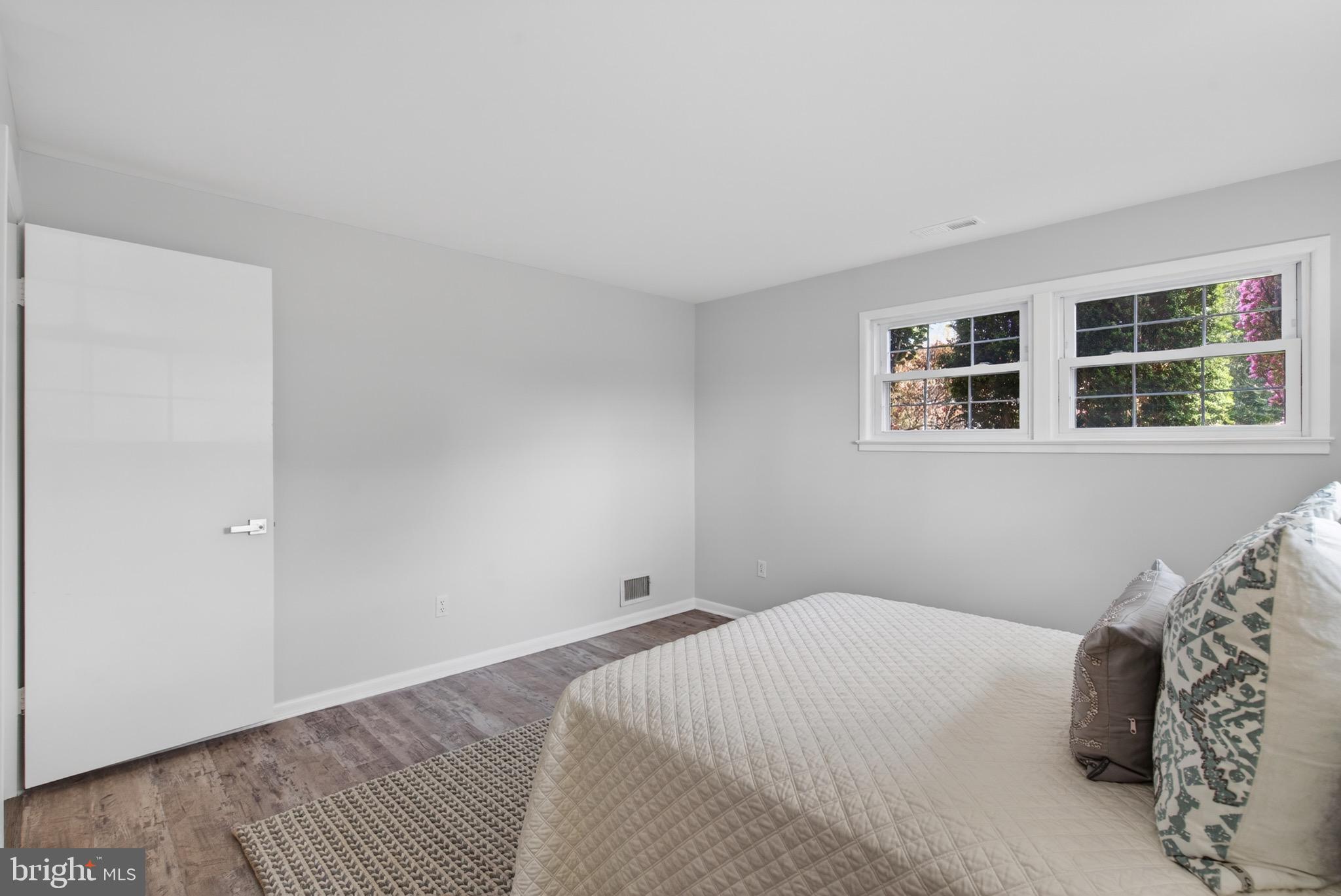 6535 Old Chesterbrook Road McLean, VA 22101 - Photo 45 of 50 a bedroom with a bed and a window