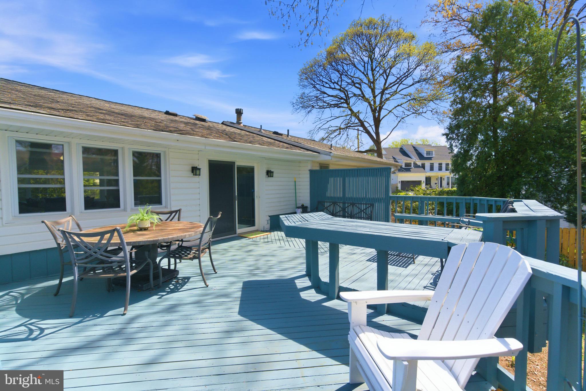 6535 Old Chesterbrook Road McLean, VA 22101 - Photo 49 of 50 a view of a patio with table and chairs and wooden floor