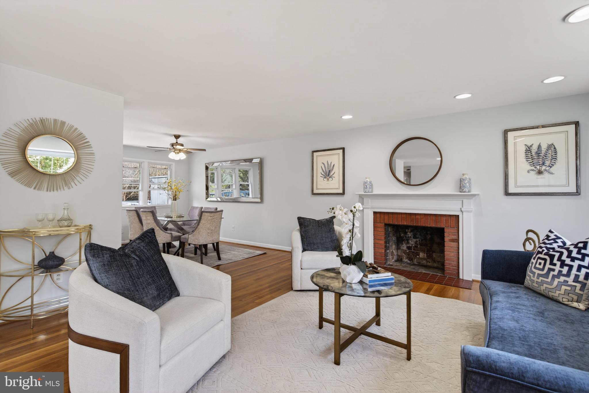 6535 Old Chesterbrook Road McLean, VA 22101 - Photo 10 of 50 a living room with furniture and a fireplace