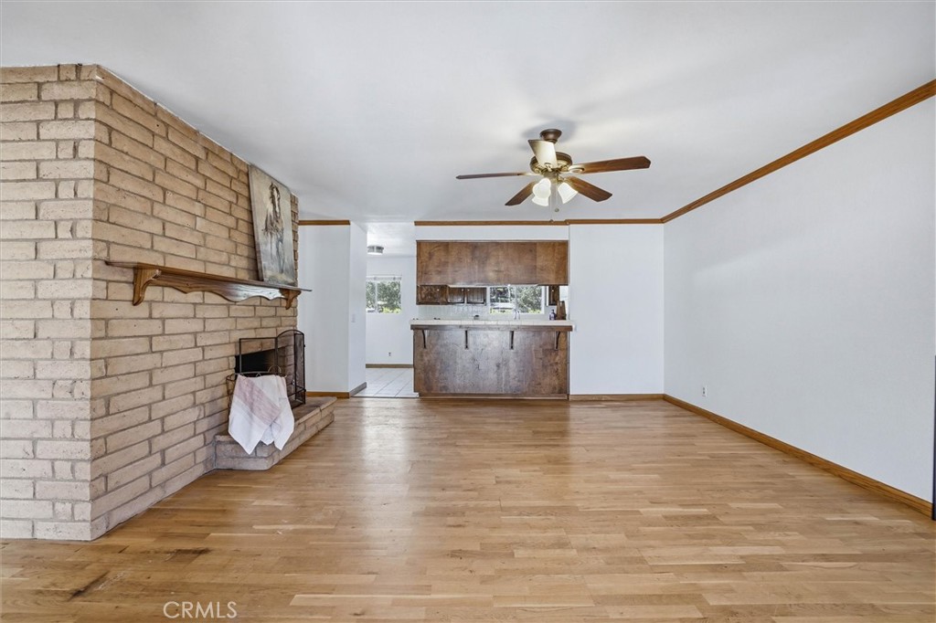 652 Pomeroy Road Nipomo, CA 93444 - Photo 10 of 60 Dining room with dual sided fireplace