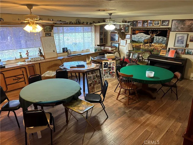 a view of a chairs and table in a patio