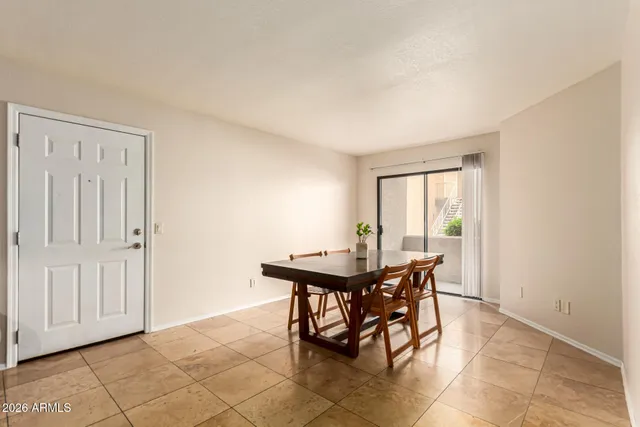 a view of a livingroom with furniture and window