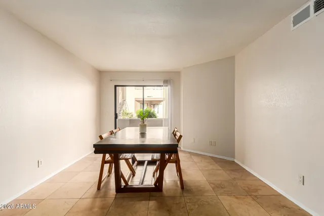 a workspace with furniture and window