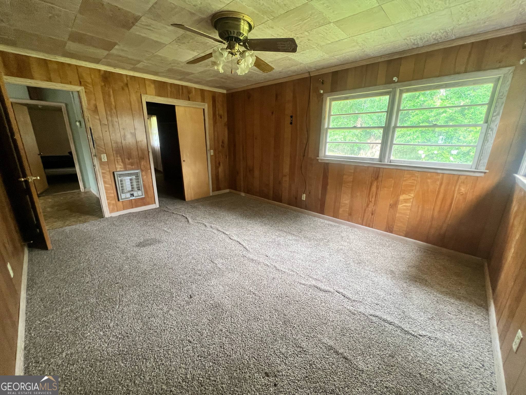 1165 Jaybird Springs Road Chauncey, GA 31011 - Photo 17 of 43 a view of an empty room with a window