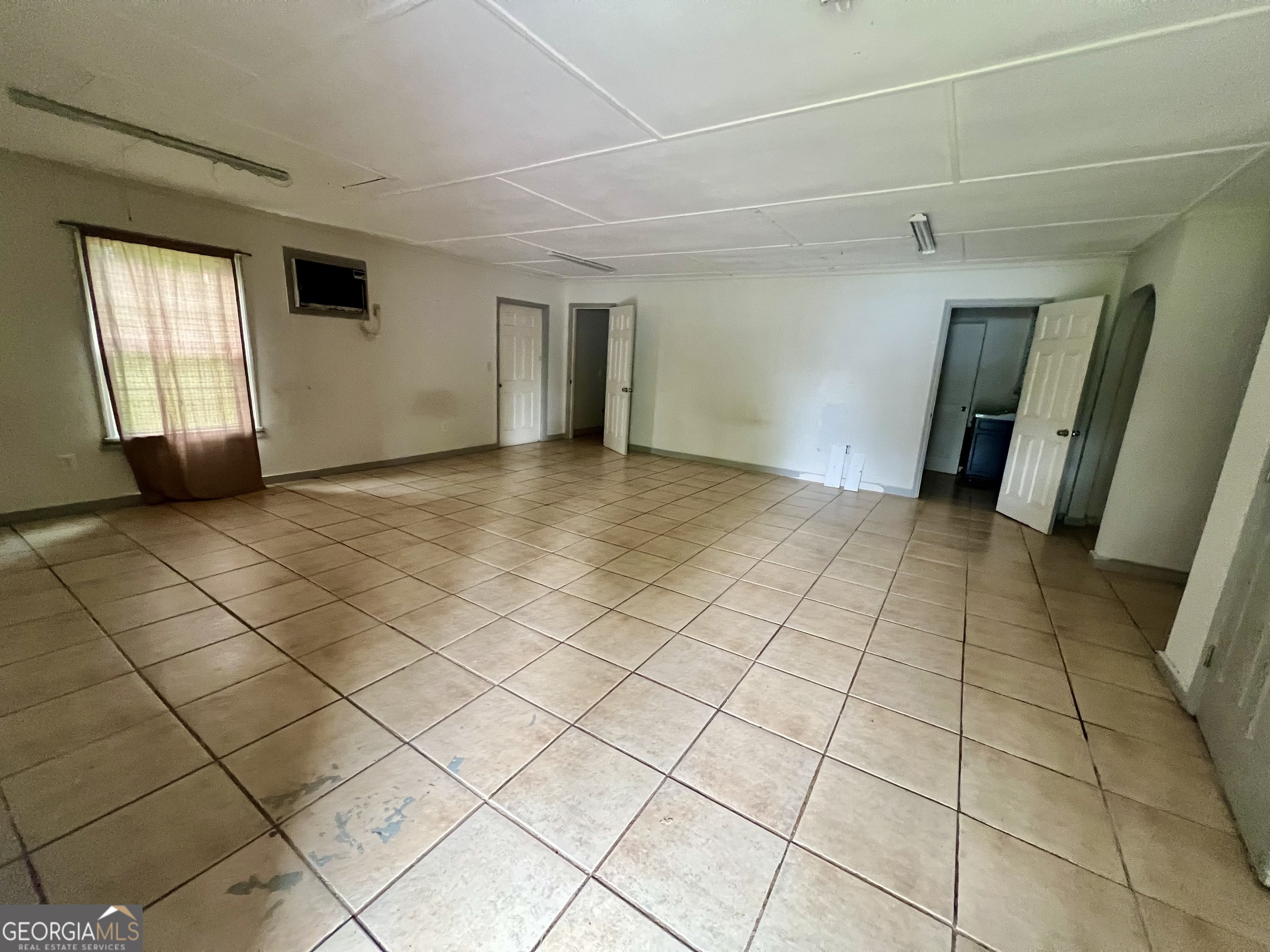 1165 Jaybird Springs Road Chauncey, GA 31011 - Photo 22 of 43 a view of an empty room and window