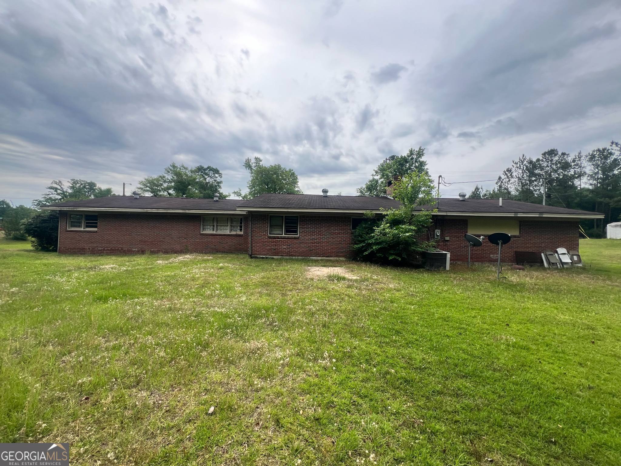 1165 Jaybird Springs Road Chauncey, GA 31011 - Photo 38 of 43 a view of outdoor space with deck and green space