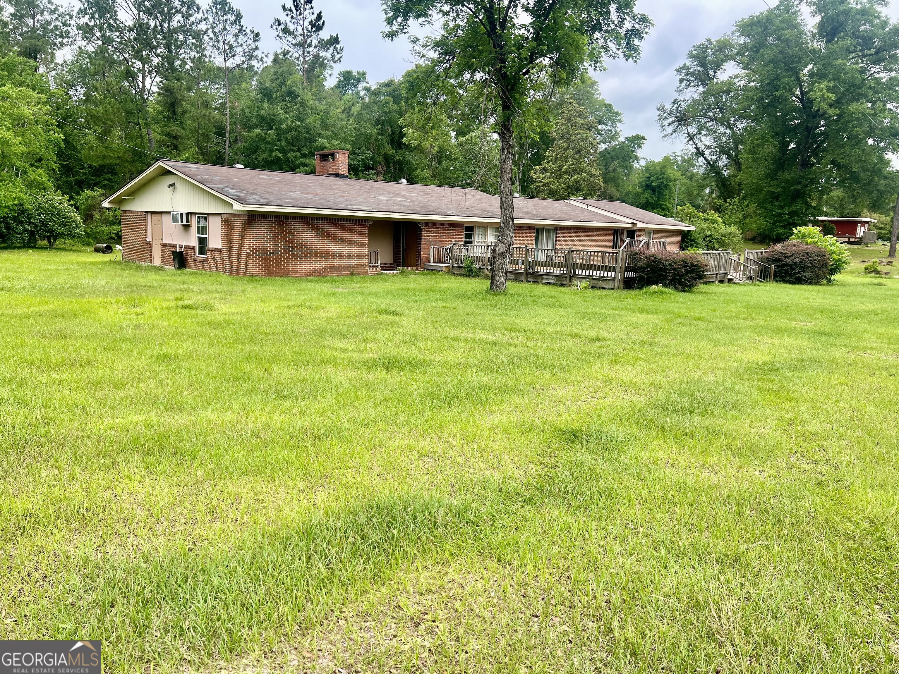 1165 Jaybird Springs Road Chauncey, GA 31011 - Photo 39 of 43 a front view of a house with garden
